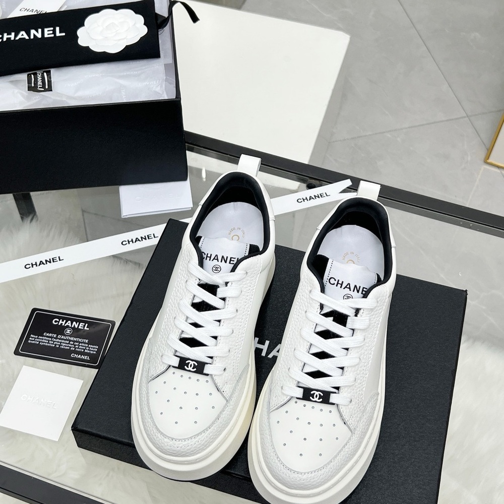 CHANEL White and Black Sneakers